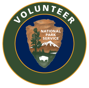The NPS volunteer logos with arrowhead in the center of the circles