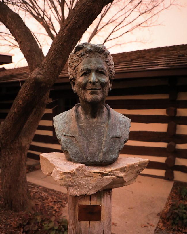 Catherine Filene Shouse bust during a winter sunset