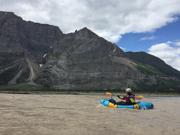 Pack Rafter on the Nizina River at Mile High Cliffs