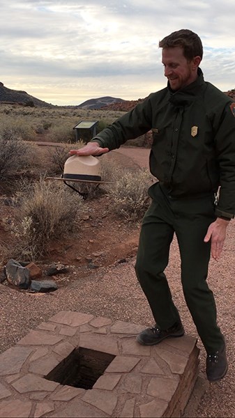 Ranger shows strength of blowhole with hat.