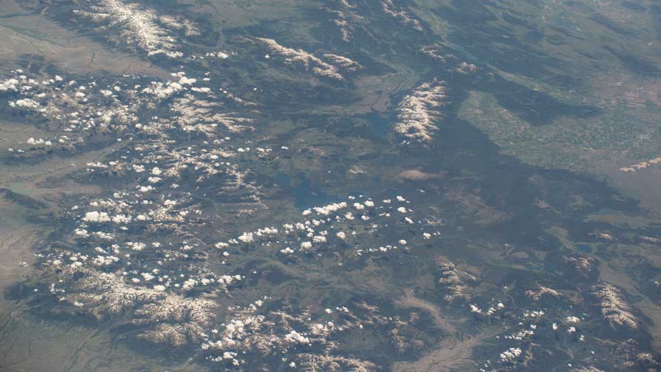 View from the International Space Station look down and south across Yellowstone and Grand Teton National Parks.