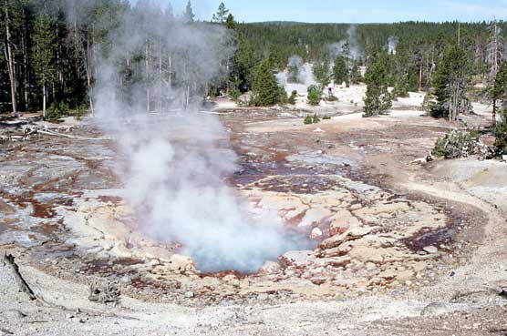 Echinus Geyser's crater is billowing steam