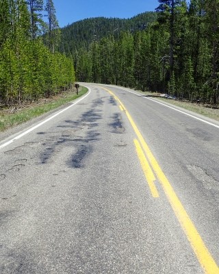a road with potholes