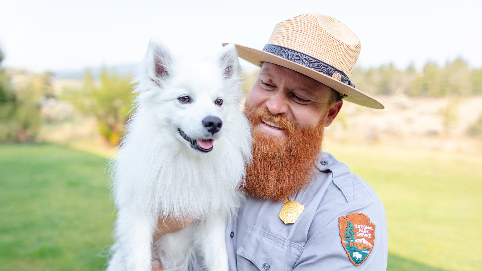 Park ranger and pet