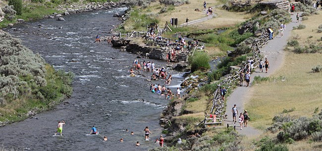 People bathing in a river