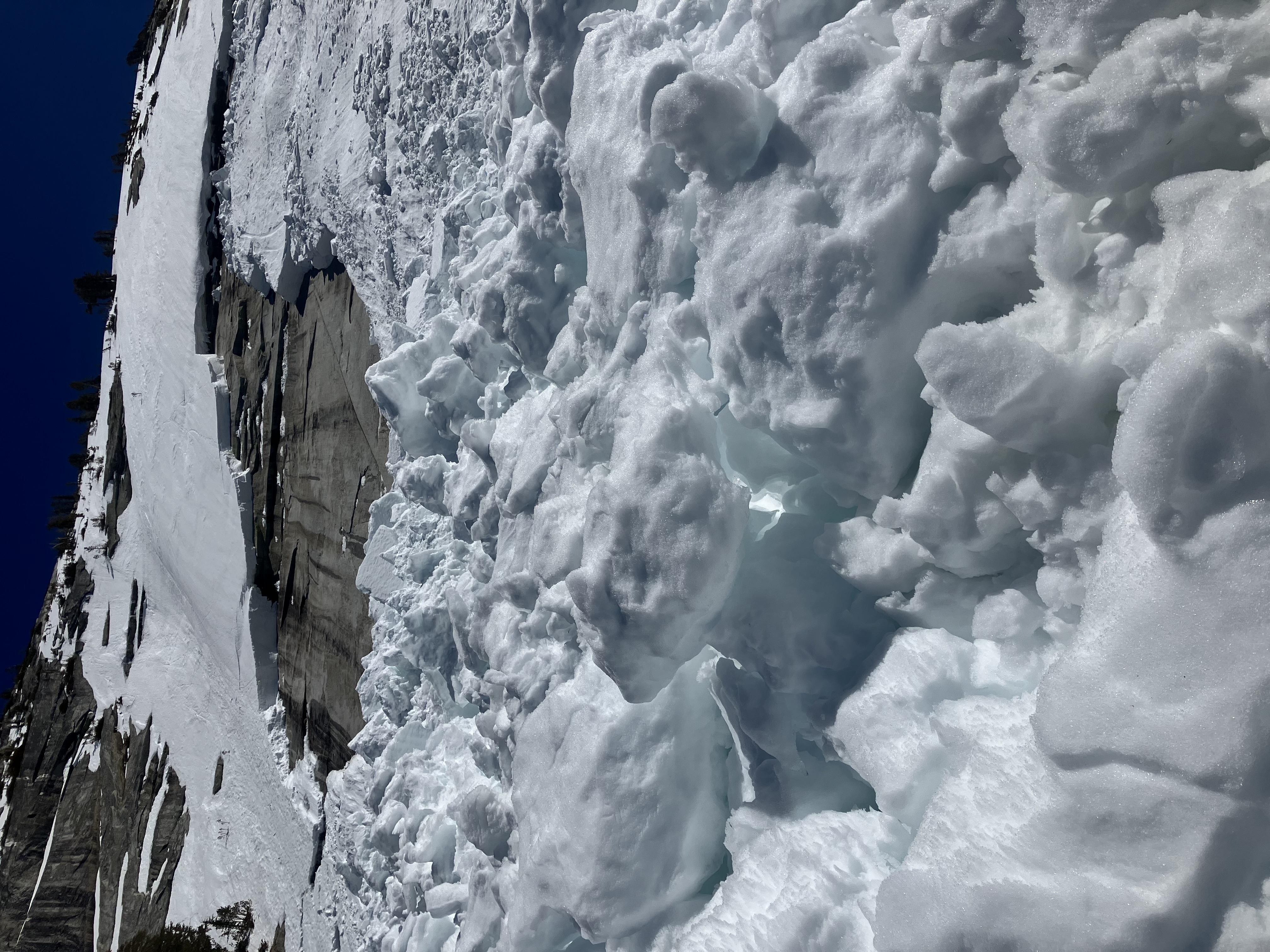 Looking up a granite ridge showing a glide avalanche