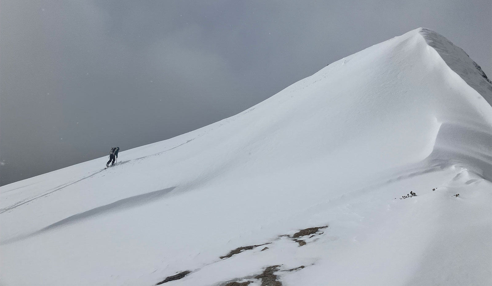 Skier heading up Lembert while on patrol on February 14, 2025.