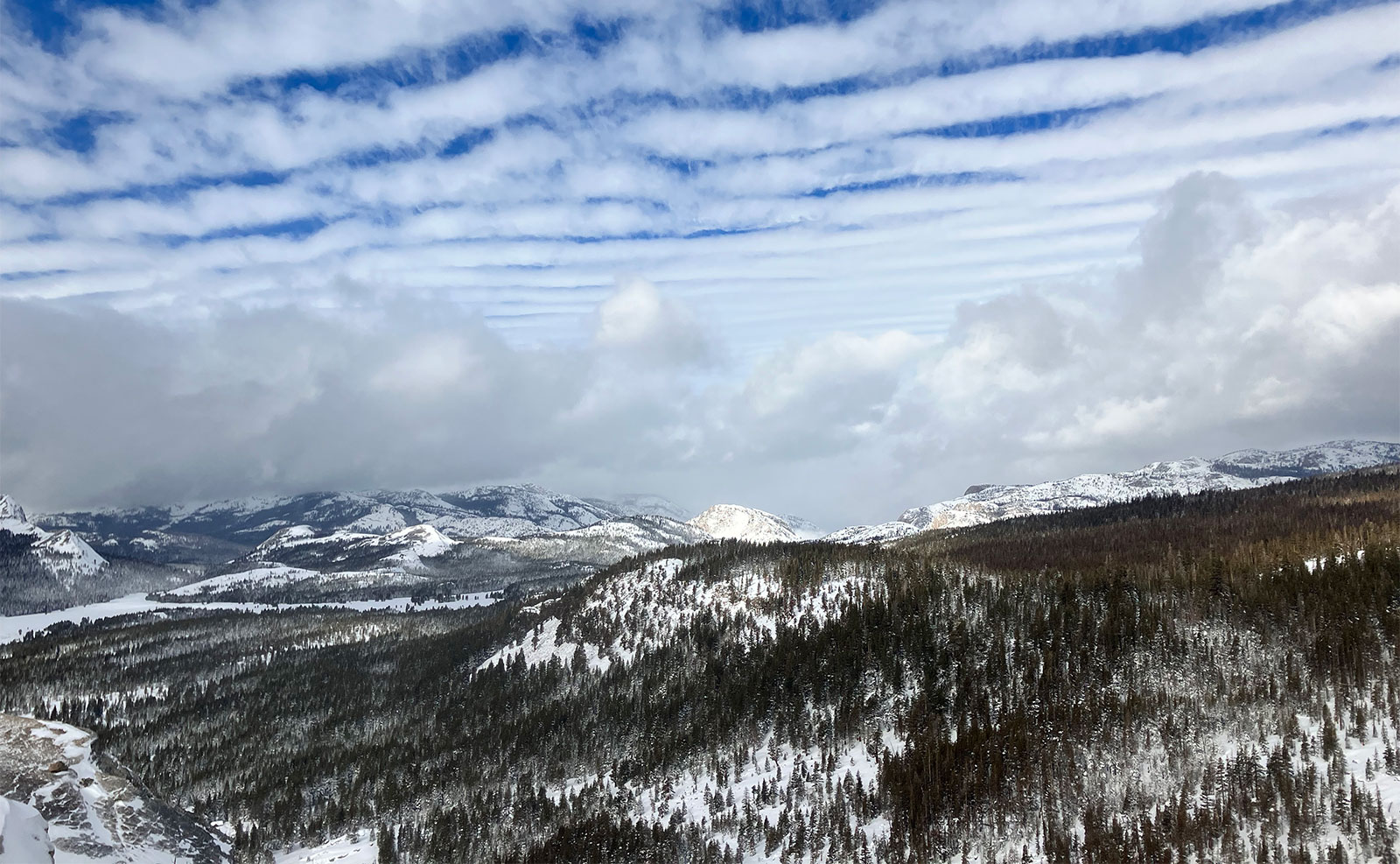 Storm clouds clearing over Tuolumne Meadows on February 7, 2025.