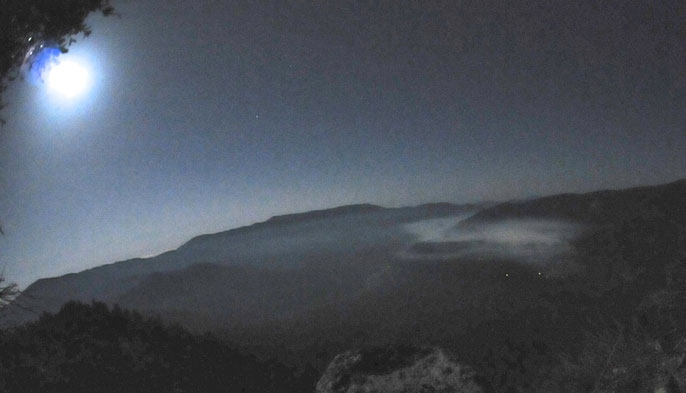 Smoke from the 2013 Wawona NW Prescribed fire, hanging in the air above the town of Wawona by moonlight