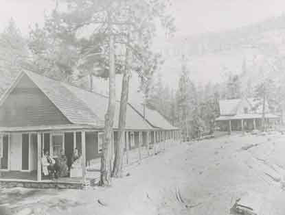 Two historic buildings nestled in the woods
