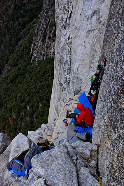 Climbers and their gear sleeping on the side of El Capitan