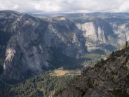 Three Brothers and Yosemite Falls, with Yosemite Valley floor below, from Taft Point