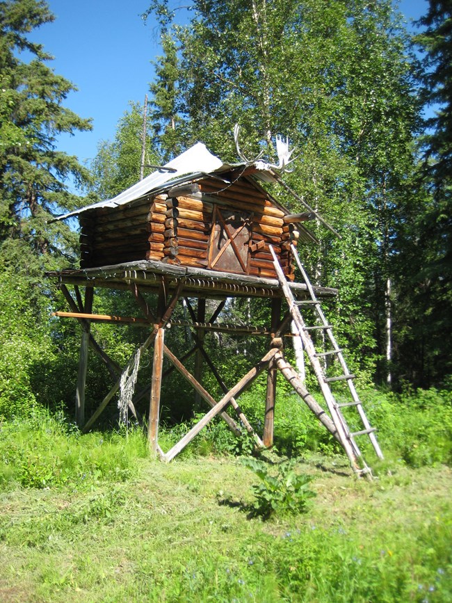 Cache at the Smith Public Use Cabin on the Yukon River in summer