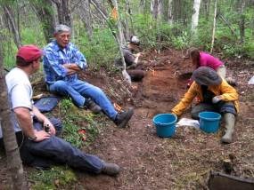Isaac Juneby with NPS historian and ASRA students as students excavate Juneby cabin