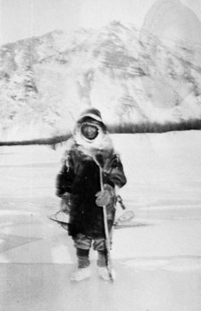 1935 photograph of “Cap” Adolphus, a Gwich’in Athabascan man born in 1884, standing on Yukon River ice at 67 degrees below zero.