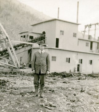 Historic photo of Johnson at the CJ Berry Dredge near circle, Alaska circa 1915.