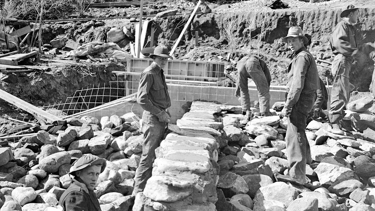 CCC crews were responsible for creating much of the water management infrastructure along the Virgin River, including retaining walls that supported the riverbanks and diversion dams, like the one pictured here.