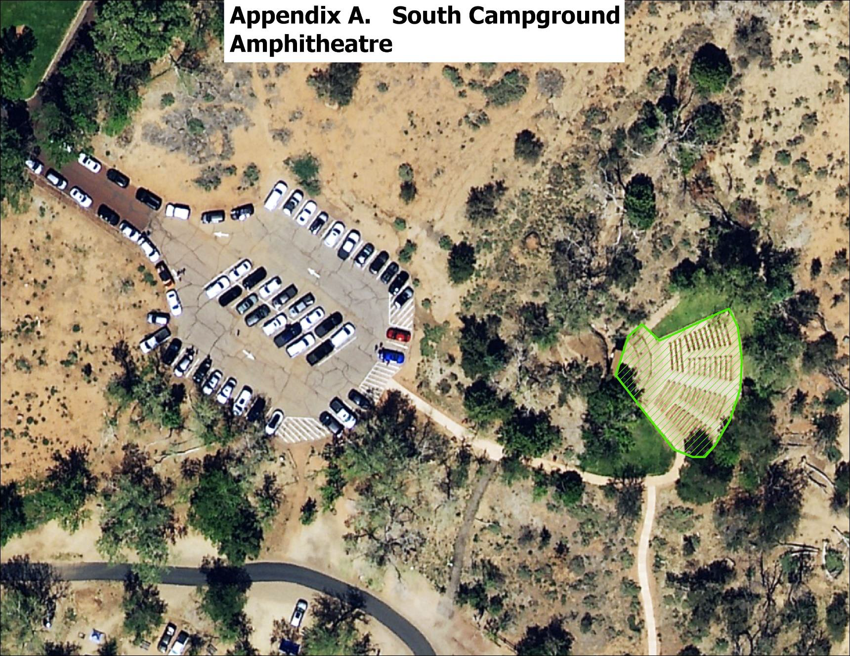 A satellite image showing an amphitheater located a short distance from a parking lot. The entire amphitheater, including the stage and seating area, is highlighted green.
